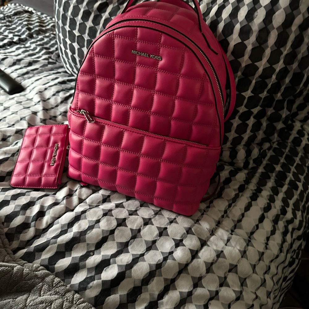 Michael Kors Pink Quilted Backpack with Luxurious Design
